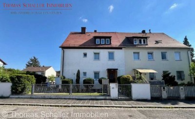 Gepflegtes Dreifamilienhaus mit Garten, Terrassen und Doppelgarage in begehrter Lage