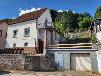Kleines, freistehendes Wohnhaus mit Garage (provisionsfrei für Käufer)