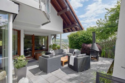 Exklusives Einfamilienhaus in Hanglage mit Wintergarten, idyllischem Garten und Doppelgarage