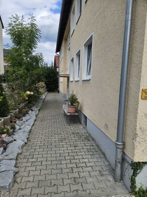 Attraktives Mehrfamilienhaus mit 7 % Bruttorendite und Ausbaureserve in charmantem Grenzort
