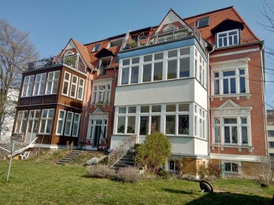 Terrassenwohnung mit Tür zum Garten