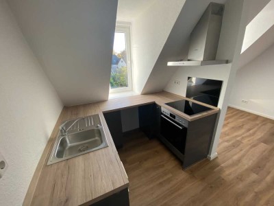 Modernes Wohnen unterm Dach – Stilvolle Dachgeschosswohnung mit Charme