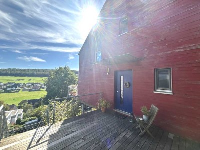 Energieeffizientes Einfamilienhaus mit Blick ins grüne