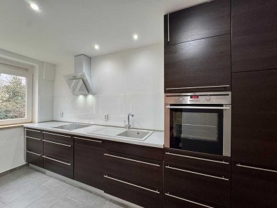4-Zimmer-Hochparterre-Wohnung mit Balkonen und EBK