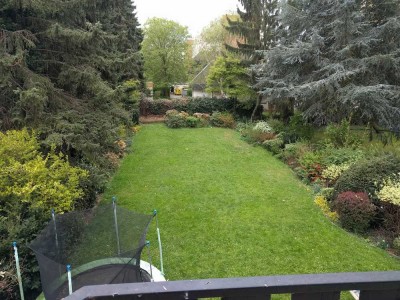 Geschmackvolle, renovierte 4-Zimmer-Maisonette-Wohnung mit Balkon und Garten