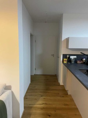 Moderne 2,5-Zimmer-Erdgeschosswohnung mit geh. Innenausstattung mit Balkon und EBK