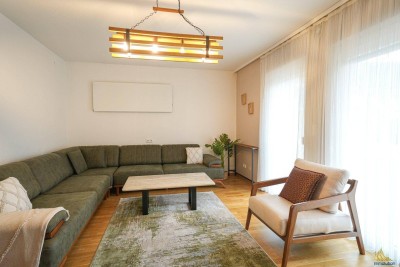 KOLSASS - GEPFLEGTE GARTENWOHNUNG MIT 4,5 ZIMMER ZU VERKAUFEN