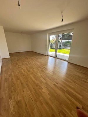 Ein Wohnjuwel der Extraklasse – Exquisite 3-Zimmer-Gartenwohnung mit sonniger Terrasse und traumhaftem Südgarten