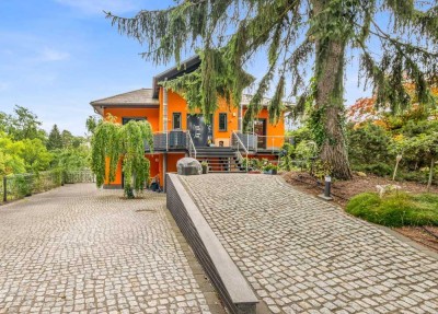 Architektenvilla mit exklusiver Ausstattung, großzügigem Grundstück und Pool
