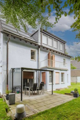 Freistehendes Mehrfamilienhaus in Top Lage: Inklusive Garten & Garage!