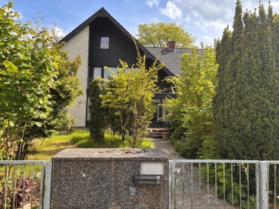 Großes Einfamilienhaus mit Einliegerwohnung in Toplage von Quickborn - sanierungsbedürftig