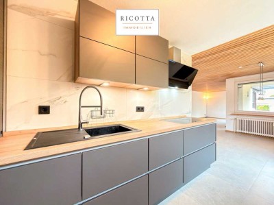 Moderne Etagenwohnung mit Balkon, Garage und stilvollem Wohnkonzept