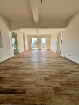 Zentrale Wohnung mit Balkon mit tollen Blick über die Stadt und Hafen.