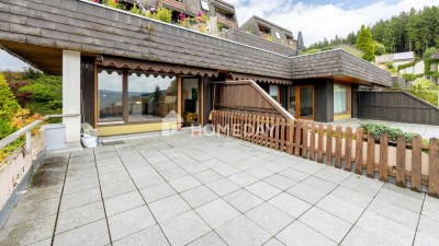 Charmante 2-Zimmer-Terrassenwohnung mit Weitblick, Südbalkon & TG-Stellplatz