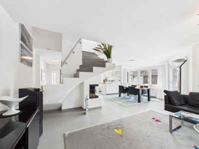 Stilvoll wohnen auf zwei Etagen – Maisonette mit Garten, Kamin, Designküche und mehr in Heimstetten