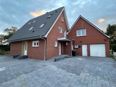 Modernes Wohnen mit Komfort und Stil – sanierte Wohnung mit großem Grundstück