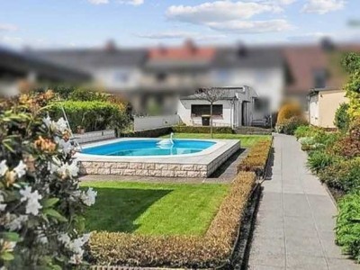 Reihenmittelhaus mit tollem Garten und Pool in Dessau-Süd
