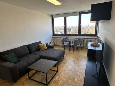 Geschmackvolle 3-Zimmer-Wohnung mit großartigem Blick auf den Rhein und die Stadt