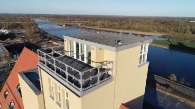 Wintergarten mit Dachterrasse mit weitem Ausblick über Elbe und Magdeburg