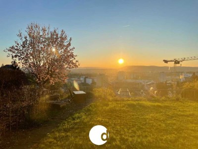 Attraktive 3,5 bis 4-Zimmer-Wohnung mit Garten in Aussichtslage