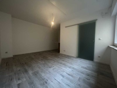 Moderne 1-Zimmer Wohnung in zentraler Lage mit Rhein- und Uninähe
