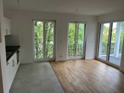 Erstbezug im Neubau – familienfreundlich & grün mit EBK, Balkon & Gäste-WC