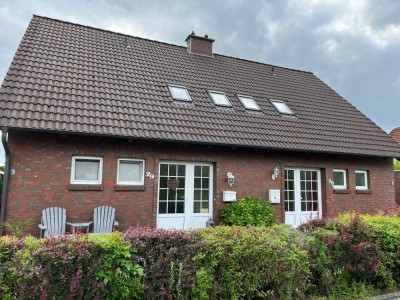 „Wohnglück in Wilhelmshaven – Doppelhaushälfte mit grünem Garten & Garage“