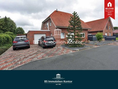 Top gepflegtes Einfamilienhaus mit Garage, Terrasse und Gartenanlage in zentraler Wohnlage!