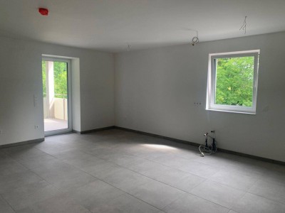 Erstbezug: exklusive Maisonette-Wohnung mit großzügigem Balkon in Grünlage
