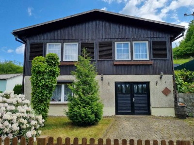 Freistehendes Einfamilienhaus mit Garage in ruhiger Waldrandlage mit Blick über Ilfeld.