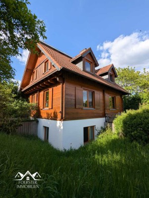 Ihr Traumhaus im Grünen – Massivholzhaus mit Kamin und großzügigem Garten