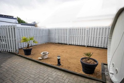 Zweifamilienhaus mit Garage, Garten, Sauna & solider Rendite in begehrter Lage in KO-Metternich