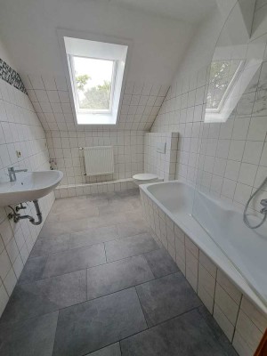 Attraktive 3-Zimmer-Dachgeschosswohnung mit Balkon und Gartennutzung in Damm