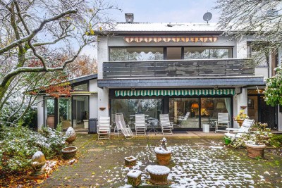 Dreiparteienhaus mit schönem Garten und Garage