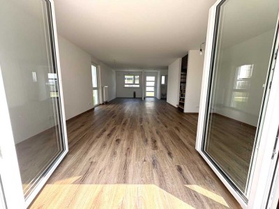 Willkommen Zuhause: Neubau mit Garten in familienfreundlicher Lage
