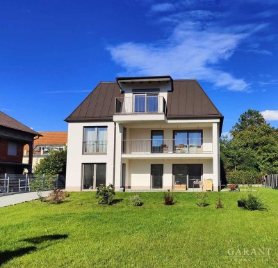 **Ihr neues Zuhause: Stilvolle Erdgeschoss-Wohnung mit Garten**