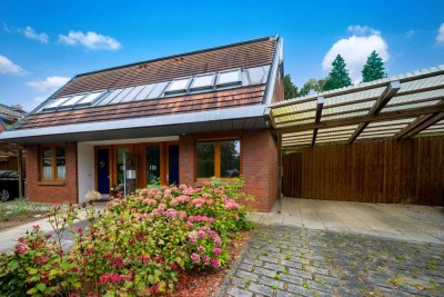Familienfreundliches Massivhaus mit ausgebautem Studio, Terrasse, Carport und gepflegtem Garten