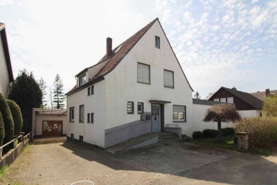 Autarkes Zweifamilienhaus mit Gewerbeeinheit und großem Gartenparadies in Bünde