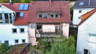 Sanierungsbedürftige Doppelhaushälfte mit herrlicher Aussichtslage!