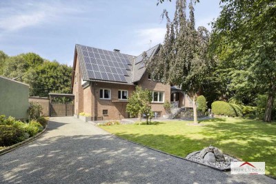 Zweifamilienhaus mit parkähnlichem Grundstück – ideal für Familien, Praxis oder Homeoffice