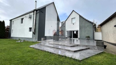 Familienglück auf dem Land – modernes Zuhause mit großem Grundstück und Platz für neue Ideen