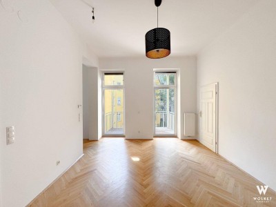 Lichtdurchflutete 2-Zimmer-Altbauwohnung mit Balkon ins Grüne – Innenhof-Ruhelage | U3 Johnstraße | Lift vorhanden