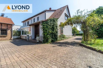 Wohnen & Wohlfühlen – Doppelhaushälfte mit Wintergarten und viel Platz im Grünen