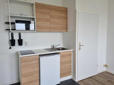 Klein, fein & gut versorgt-1-Zimmer-Wohnung mit Einbauküche in Mehrgenerationenhaus