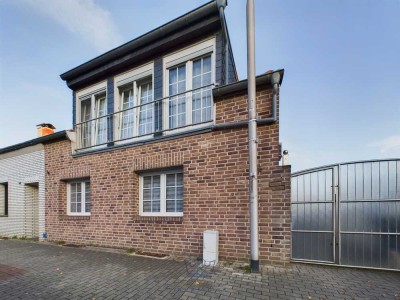 Zweifamilienhaus mit Garten in zentraler Lage