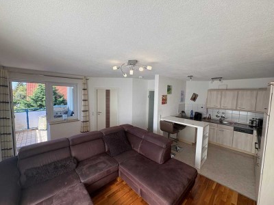 2-Zimmer-Wohnung mit Balkon und Tiefgaragen Stellplatz in Ludwigsfeld.