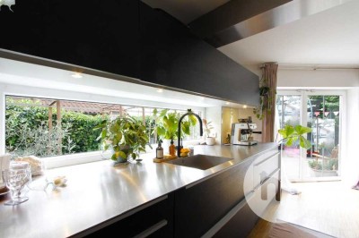 3-Zimmer-Maisonettewohnung mit stilvoller Küche und großem Traumgarten