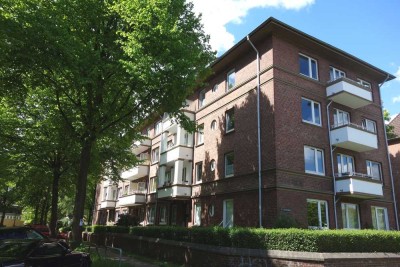 Schöne 2. Zimmerwohnung mit Wohnküche, Holzdielen und Balkon