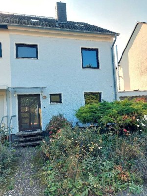 Tolle Doppelhaushälfte in 1A-Ortsrandlage von Ober-Olm mit Garten, Terrasse und Garage.