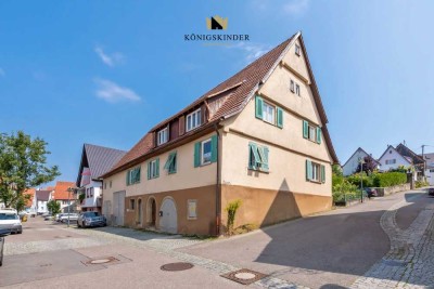 Historisches Mehrfamilienhaus mit Ausbaureserve, Gewölbekeller & Gartenland in zentraler Lage